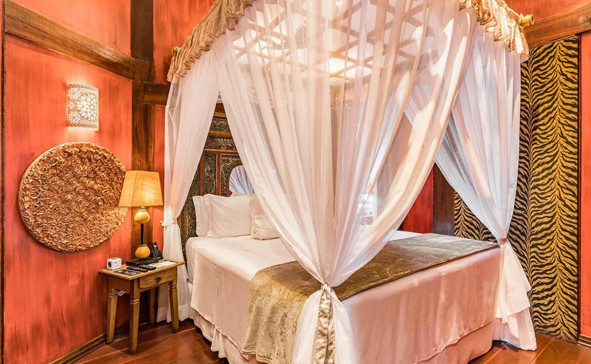 Dpny Beach Hotel & Spa 일랴벨라 외부 사진 A mosquito net over a bed