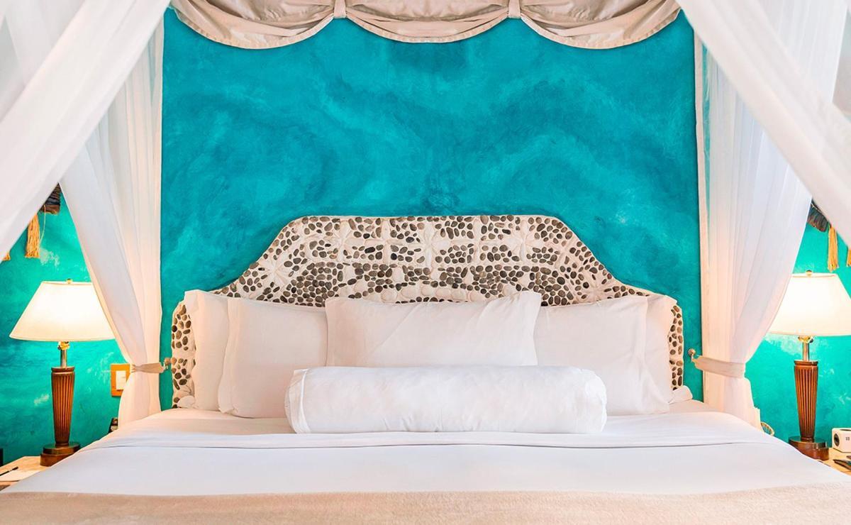 Dpny Beach Hotel & Spa 일랴벨라 외부 사진 A bed with a headboard